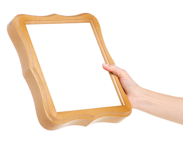 Wooden photo frame in hand - Fotografie, Obrázek