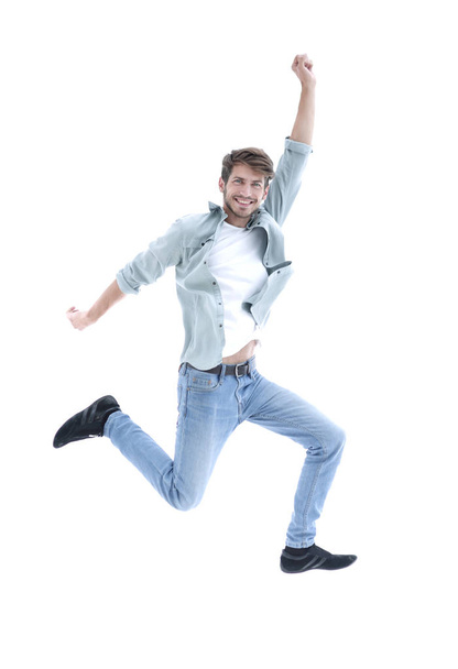 Happy man jumping in air over white background - Foto, immagini