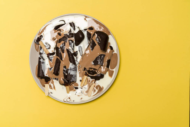 melted ice cream in a plate - Photo, Image