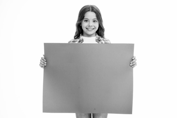 Happy girl with pink promo board isolated on white. Child smile hold empty poster for sale. place for an ad or announcement. Smiling beauty. Cute and adorable. Advertising your product, copy space - Valokuva, kuva