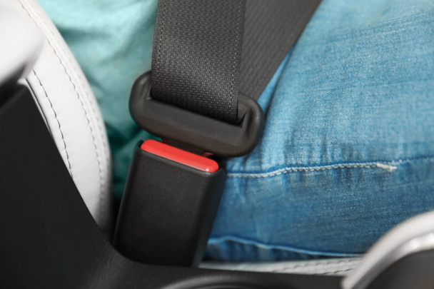 Driver with fastened safety belt in car, closeup - Foto, Bild