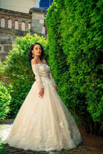Elegant wedding salon is waiting for bride. Beautiful wedding dresses in boutique. Happy bride before wedding. Wonderful bridal gown. woman is preparing for wedding. Dreams come true. Future life - Photo, Image