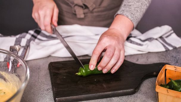 slicing jalapeno peppers for spicy jalapeno cornbread, flat lay - Photo, Image