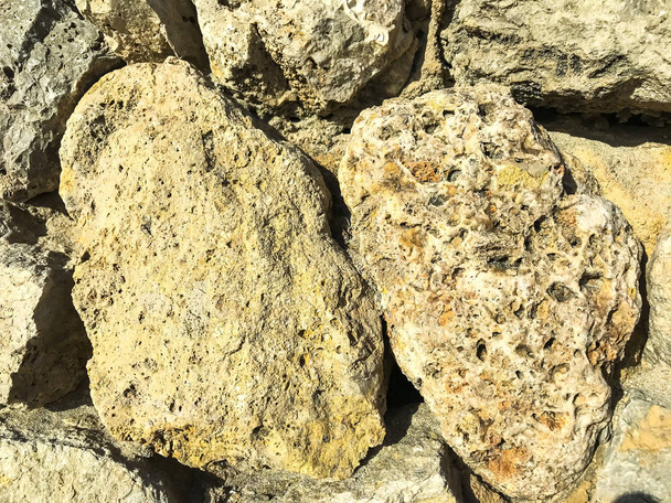 Texture, background, wall of large natural, untreated stones - Photo, Image