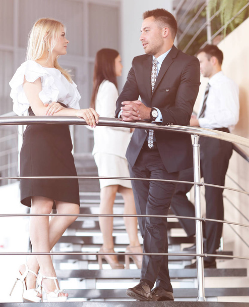 businessman and business woman standing on the terrace of the office. - Foto, imagen