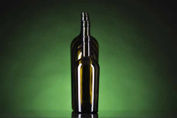 bottles on a green background - Photo, Image