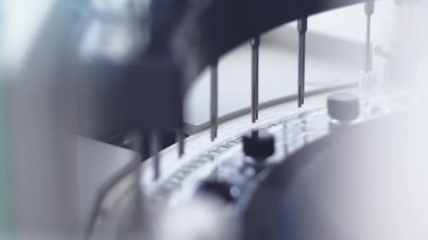 Closeup of a modern robotic machine for blood centrifugation and urinalysis. Hospital laboratories, automatic biochemical analyzer - Кадри, відео