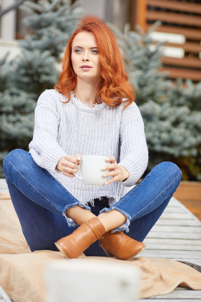 Romantic Autumn Woman Model with Red Hair, with Fall Fashion Girl Outdoors - 写真・画像