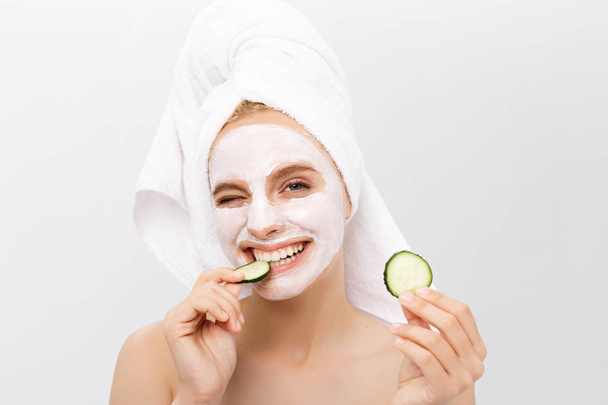 Beautiful woman with facial mask on white background - Foto, afbeelding