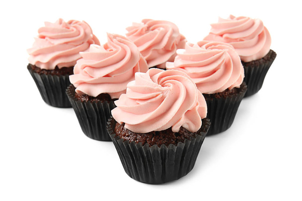 Deliciosos cupcakes sobre fondo blanco
 - Foto, imagen
