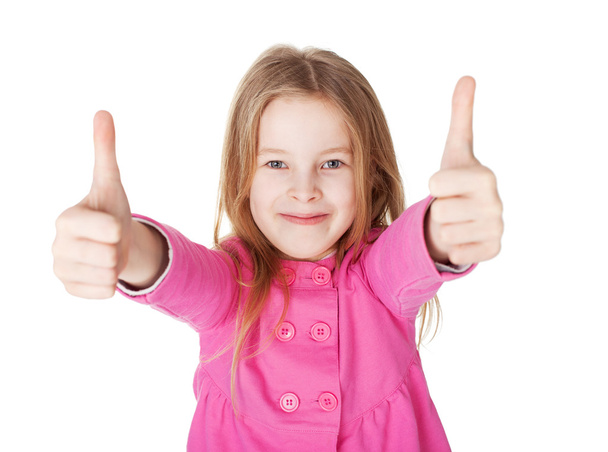 Cute little girl showing thumbs up - Foto, imagen