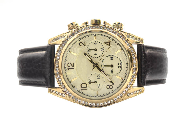 reloj de pulsera de oro con correa de cuero
 - Foto, Imagen