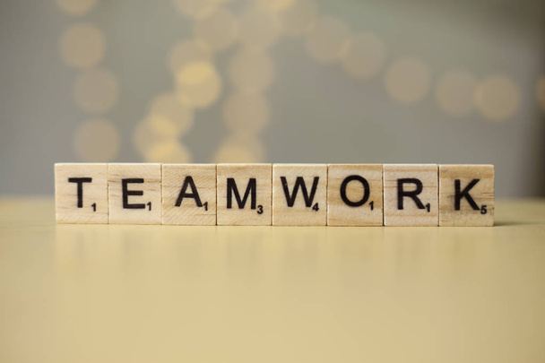 Team Teamwork, business motivational inspirational quotes, wooden words typography lettering concept - 写真・画像