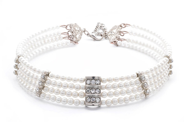 白い背景の真珠のネックレス - 写真・画像