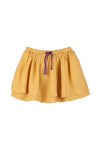 Children's yellow skirt on a white background - Photo, Image