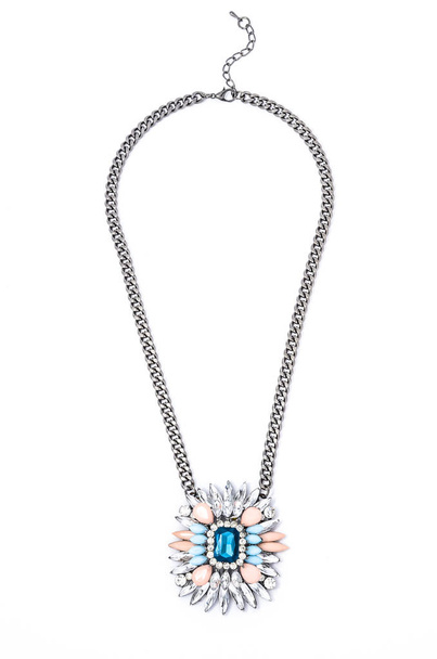 pendant with flower and blue gem  on a white background - Photo, Image