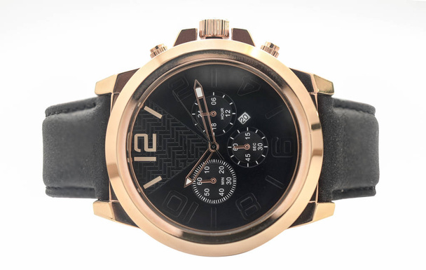 золотий наручний годинник зі шкіряним ремінцем
 - Фото, зображення