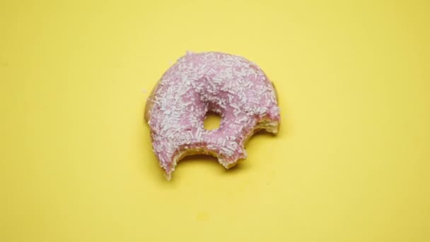 Donut biting stop motion macro, junk food and unhealthy diet, overweight problem - Filmagem, Vídeo