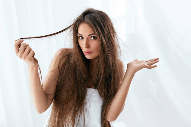 Hair Problem. Woman With Dry And Damaged Long Hair - Zdjęcie, obraz