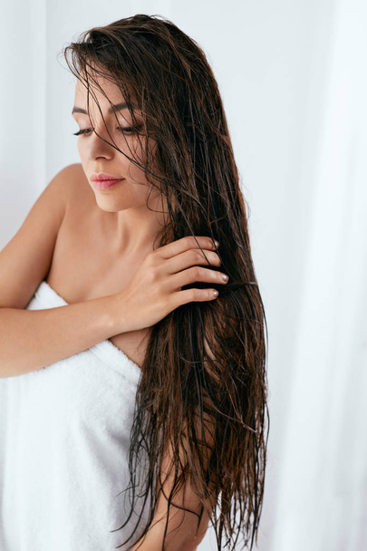Hair And Body Care. Woman With Wet Long Hair Wrapped In Towel - Fotografie, Obrázek
