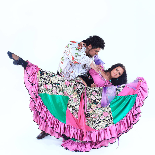 professional dance couple in a Gypsy costume perform folk dance - Foto, imagen