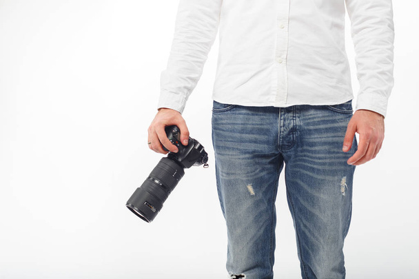 Young man photographer on background,close up - Φωτογραφία, εικόνα