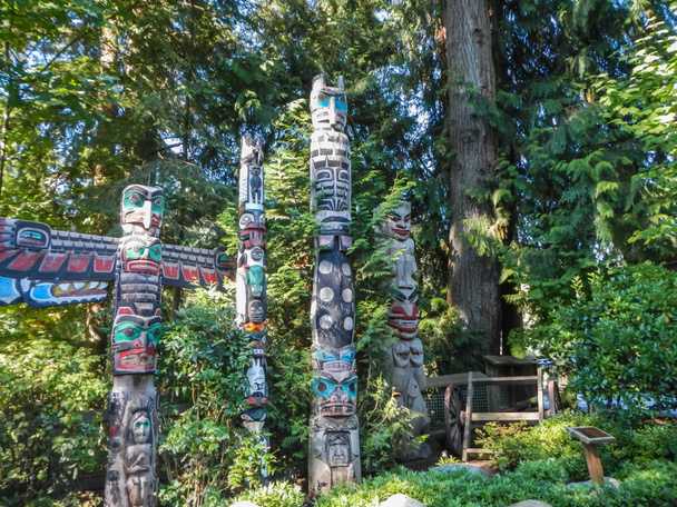 Colorful indian totems in stanley park vancouver canada summer - Photo, Image