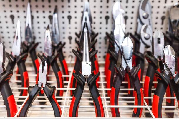 Pliers close-up. Professional electric tools. Electric tools background. - Photo, Image
