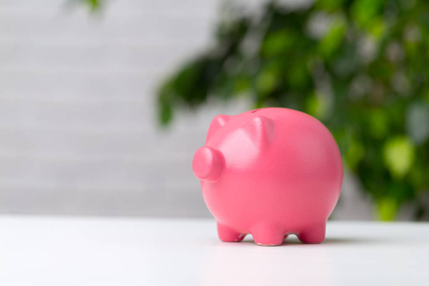 Piggy bank on table with copy space - Foto, Imagem