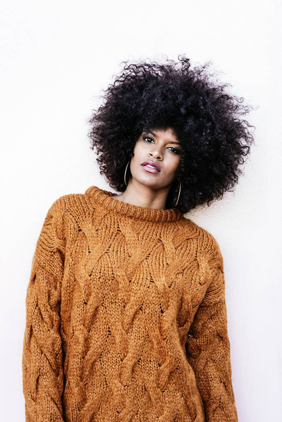 Portrait of attractive afro woman in over the wall. Hair style concept - Foto, imagen