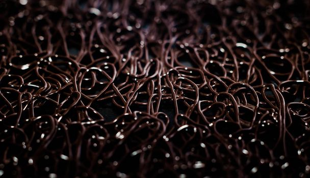 texture pattern of dark brown rubber on a black background - Foto, imagen