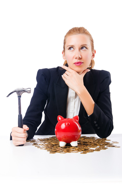kobieta breaking piggy bank oszczędności - Zdjęcie, obraz
