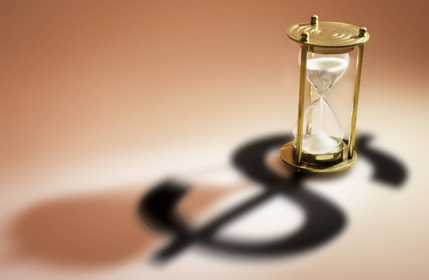 Hourglass and Dollar Symbol on Warm Background - Valokuva, kuva