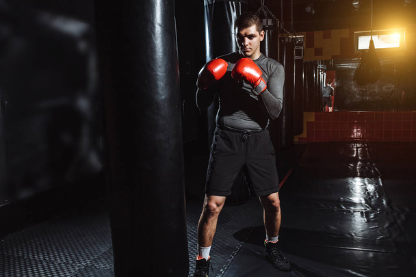 Boxer hits a speed bag in the gym - Fotó, kép