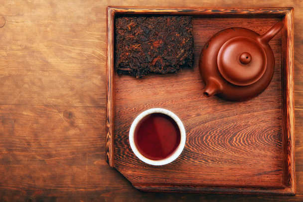 Chinese teapot black tea cup table  - Foto, imagen