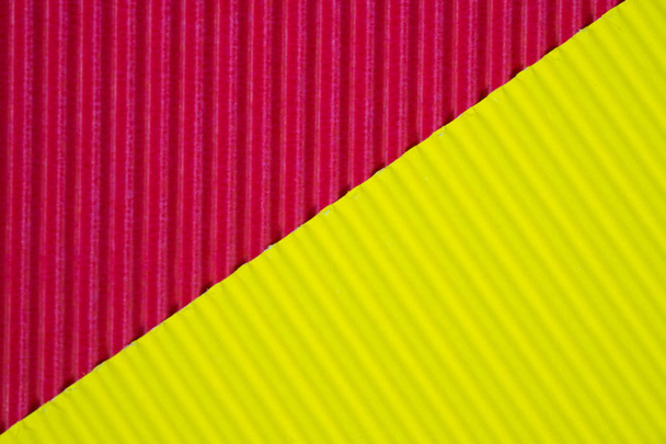 Red and yellow corrugated paper texture, use for background. vivid colour with copy space for add text or object. - 写真・画像