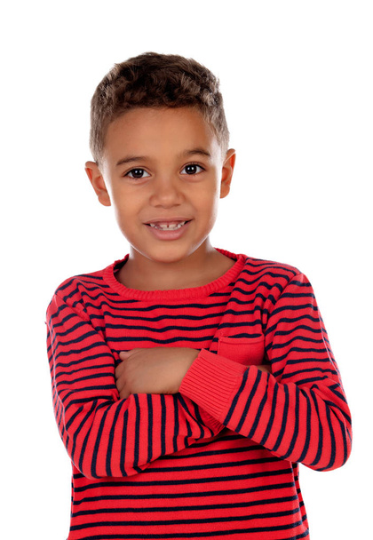 Beautiful latin child with red striped shirt isolated on a white background - 写真・画像