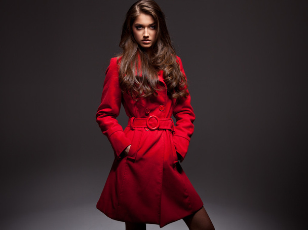 Young woman in a coat for autumn winter fashion - 写真・画像