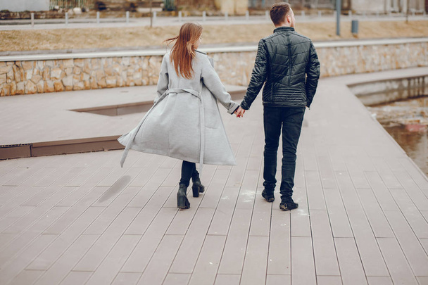 Loving couple walking around the park. - Photo, Image