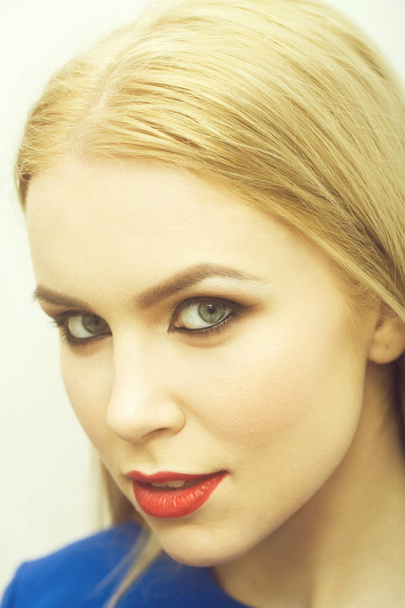 Woman with red lips and professional makeup - Foto, Bild