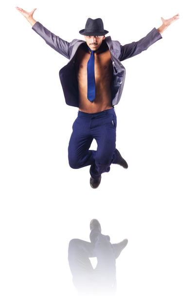 Muscular half naked businessman jumping on white - Photo, image