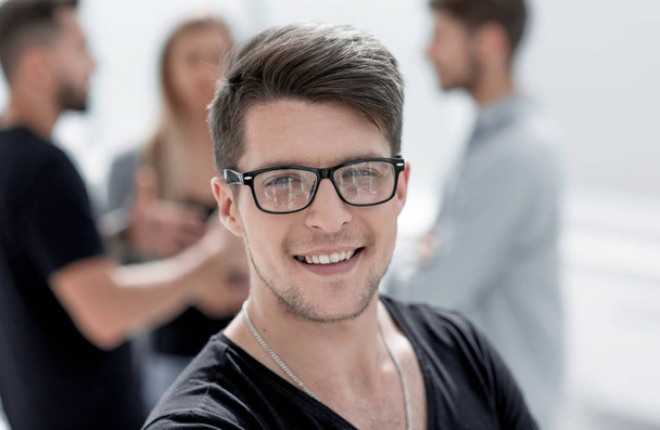 Close up portrait of a handsome guy with a smile on his face - Fotografie, Obrázek