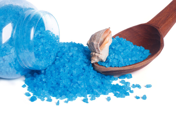 Blue bath salt and sea shell on a spoon next to a glass jar - Photo, Image