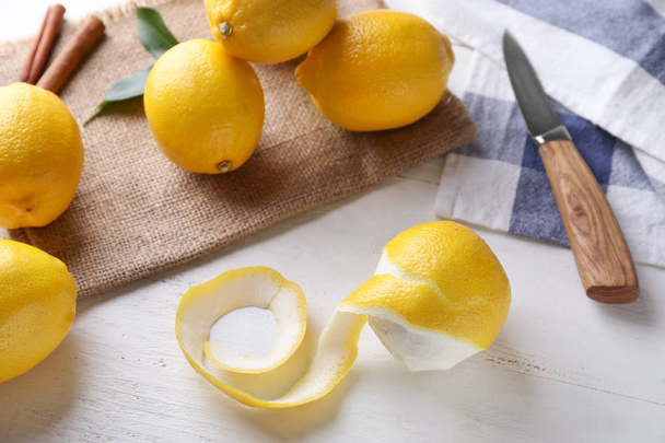 Ripe lemons on white wooden background - 写真・画像