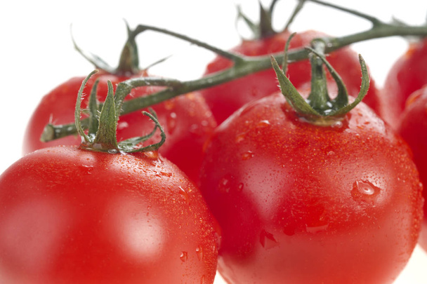 Tomatoes cherry isolated on white. Selective focus. - Foto, immagini
