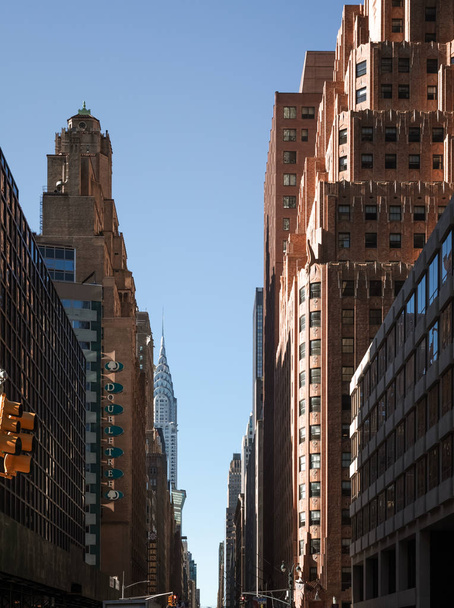 New York, USA - Sep 23, 2017: Manhattan street scene. Chrysler building and manhattan modern architecture. Manhattan is the most densely populated of the five boroughs of NYC - Zdjęcie, obraz