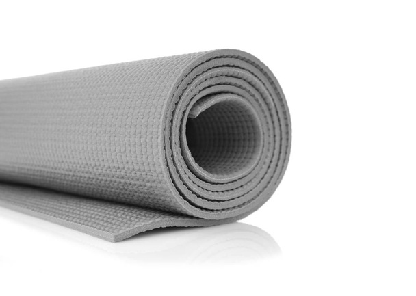 Grey yoga mat isolated on white background  - Foto, Imagen