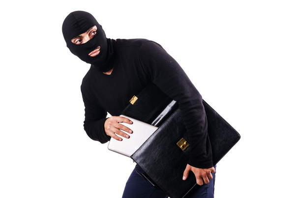 Industrial espionage concept with person in balaclava - Photo, Image