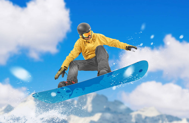 snowboardista provádějící skok - Fotografie, Obrázek
