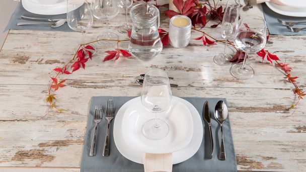 white plate table setting on wooden table - Photo, Image